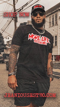 a man wearing a t shirt with the words smokelife on it